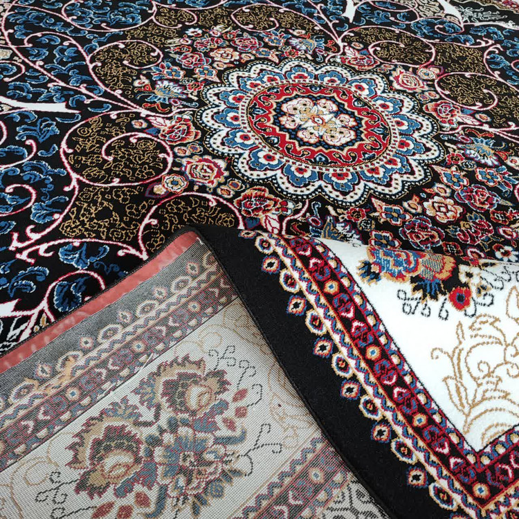 تصویر از زاویهای متفاوت از فرش چکاوک سورمهای 500 شانه، که طرحهای ظریف آن و رنگهای شیک سورمهای، به دکوراسیون منزل شما جلوهای خاص میدهد